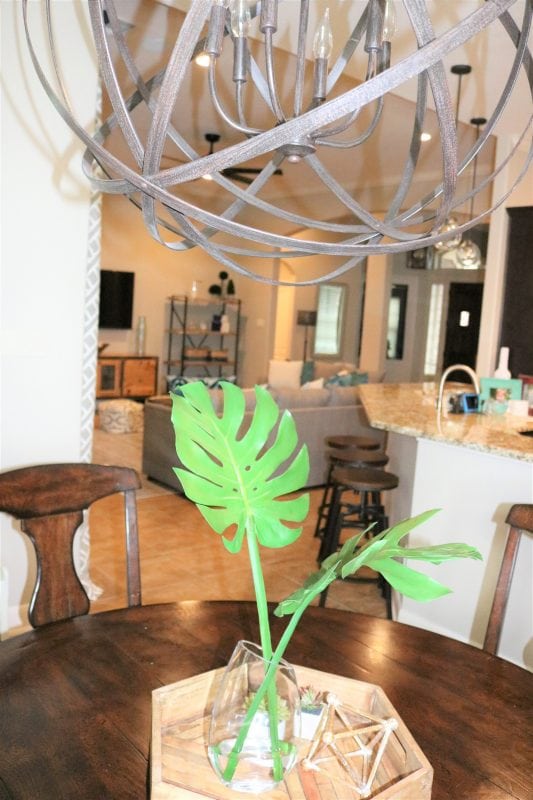 interior designer, interior design, modern farmhouse, after, houston, houston interior designer, the woodlands, modern farmhouse dining room, modern farmhouse living room, farmhouse, interior styling, dining table, chandelier, rug, baskets, art, lamp, console, dining room decor, wallpaper, sofa, love seat, mirror, mantle decor, farmhouse mantle, farmhouse living room, colorful house, colorful living room, colorful dining room