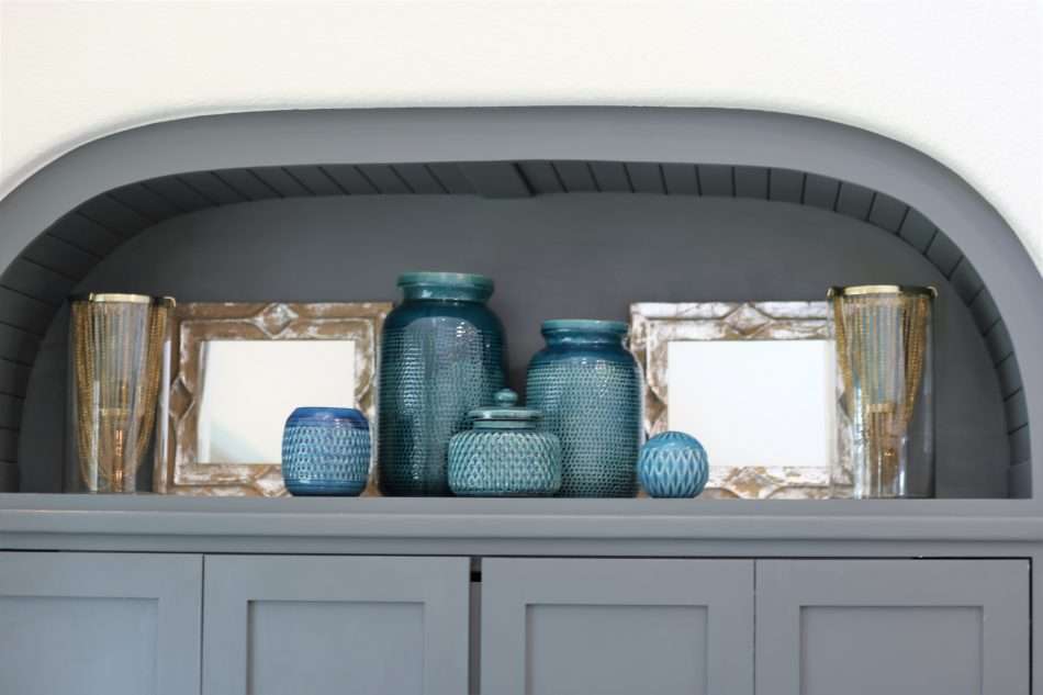 living room decor, living room colors, blue living room, gray sofa, bar stools at island. ivory kitchen, summer decor, blue summer decor, summer living room, colorful living room, coffee table, marble coffee table, coffee table decor, hydrangeas, blue vases, built ins, living room built ins, display box