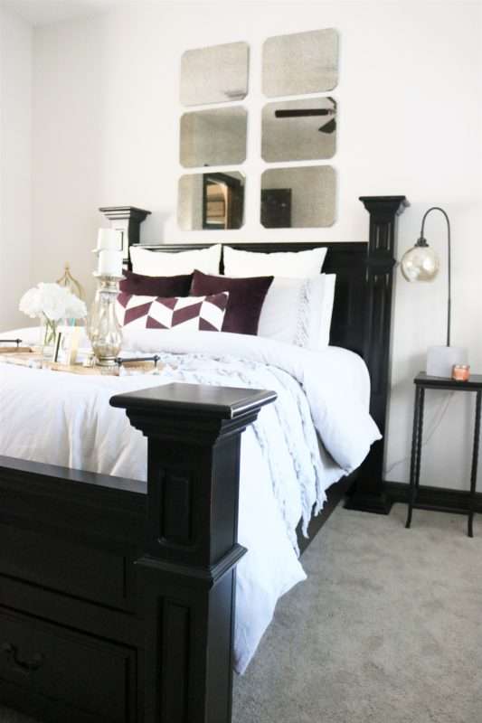 chic guestroom, chic, girl guestroom, guestroom. how to style a guest room, colorful chair, mirror over bed, colorful room, guestroom styling, guestroom check list