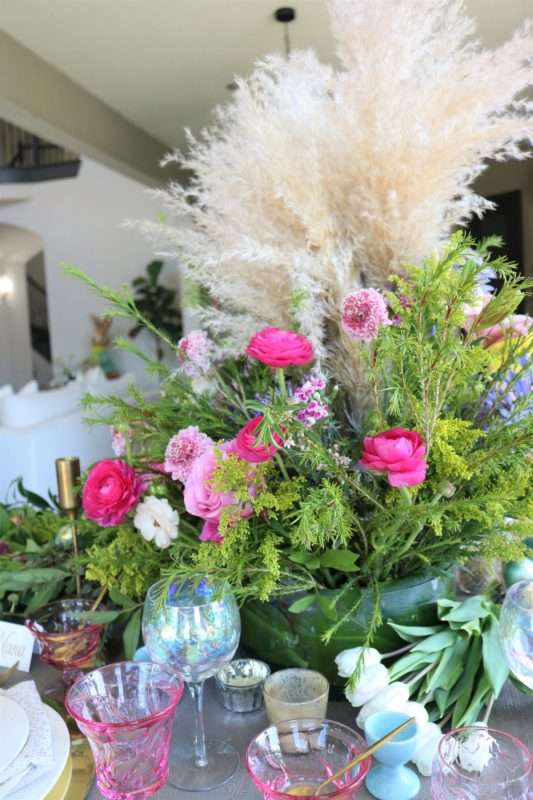 MRI, houston interior designer, home decor influencer, Easter, Easter table setting, Easter flowers, colored glass, spring flowers, cascading flowers, bunny, kids Easter table, fun Easter table setting, Easter decorations, how to decorate for Easter, easy Easter decorations, pink glasses, Easter table setting, Easter tabelscape, elegant dining table, whimsical kids table, playful easter table, vintage table setting, table setting ideas, easter table setting ideas, colorful table setting, achievable easter table setting, table décor, chic easter table setting, budget friendly table setting