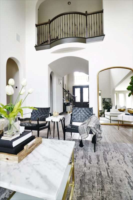 MRI, MRI home, Houston Interior Designer, Home Décor, Home Décor Influencer, Houston Interior Design, Foyer, Foyer Refresh, Foyer Table, Entry Design, Entry Table, Entry wall art, Foyer Wall art, entry décor, foyer décor, simple foyer design, gallery wall, dining table, navy sofa, minimalist design, modern dining table, interior designer tips