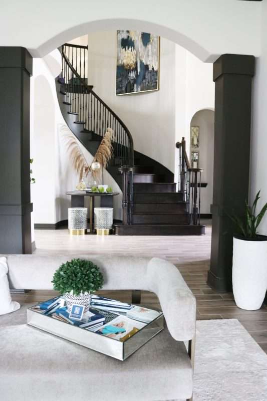 MRI, MRI home, Houston Interior Designer, Home Décor, Home Décor Influencer, Houston Interior Design, Foyer, Foyer Refresh, Foyer Table, Entry Design, Entry Table, Entry wall art, Foyer Wall art, entry décor, foyer décor, simple foyer design, gallery wall, dining table, navy sofa, minimalist design, modern dining table, interior designer tips