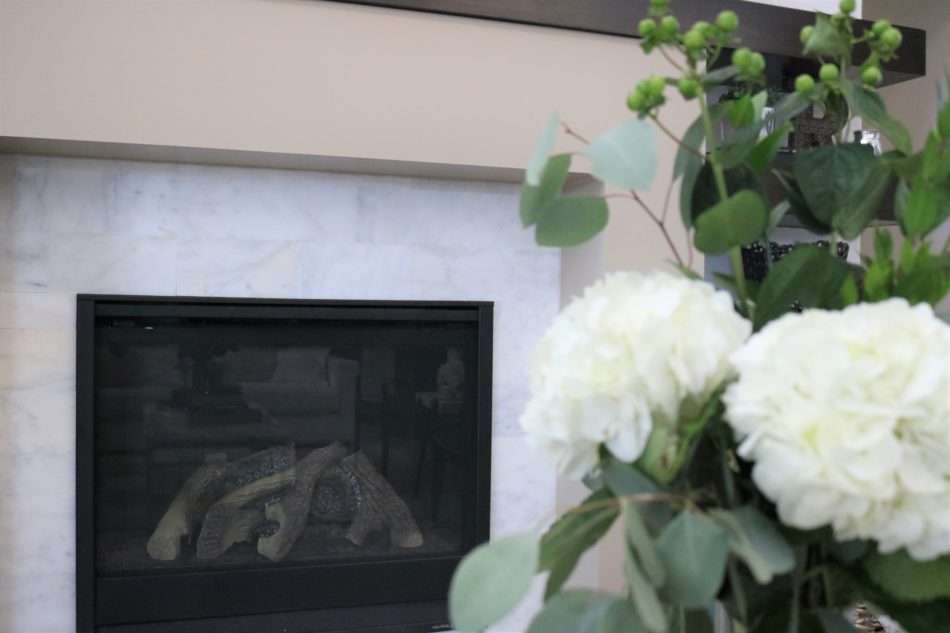 Beaumont Interior Designers, creating balance on wall with fireplace, design modern fireplace, designing floating shelves, fireplace remodel reveal, fireplace with floating shelves, grand fireplace, houston interior design, Houston Interior Designers, how to design a modern fireplace, How to remodel a fireplace, How to scale a fireplace remodel, Melissa Roberts Interiors, Modern Fireplace Remodel, mri, original fireplace designs, remodel dated fireplace, step by step guide to remodeling fireplace, tile to use for fireplace, unique fireplace design, unique fireplace elements, what color to paint cabinets, what color to paint shelves, What stain color to use for shelves