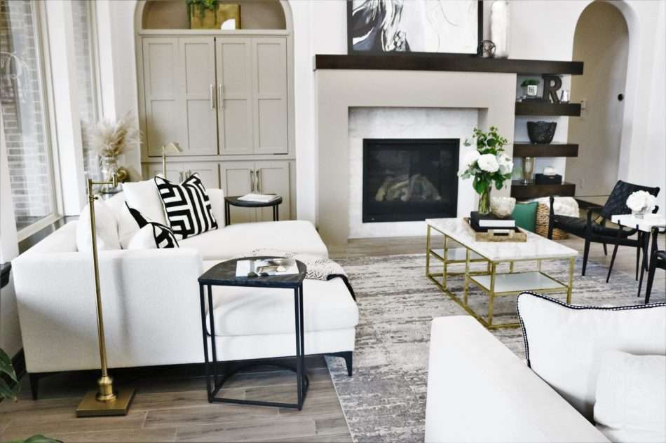 MRI, Melissa Roberts Interiors, Houston Interior Designer, Houston Interior Design, Beaumont Interior Design, Living Room Update, Living Room Reveal, Living Room Refresh, How to refresh your living room, summer living room, kitchen barstools, kitchen counter stools, kitchen pendant lights, living in your home during construction, fireplace remodel, modern fireplace, white sofa, wall mirror, gold wall mirror, chase lounge, unique chairs, living room accessories, how to style your living room, how to stage your living room, 2019 Living Rooms, minimalist design 