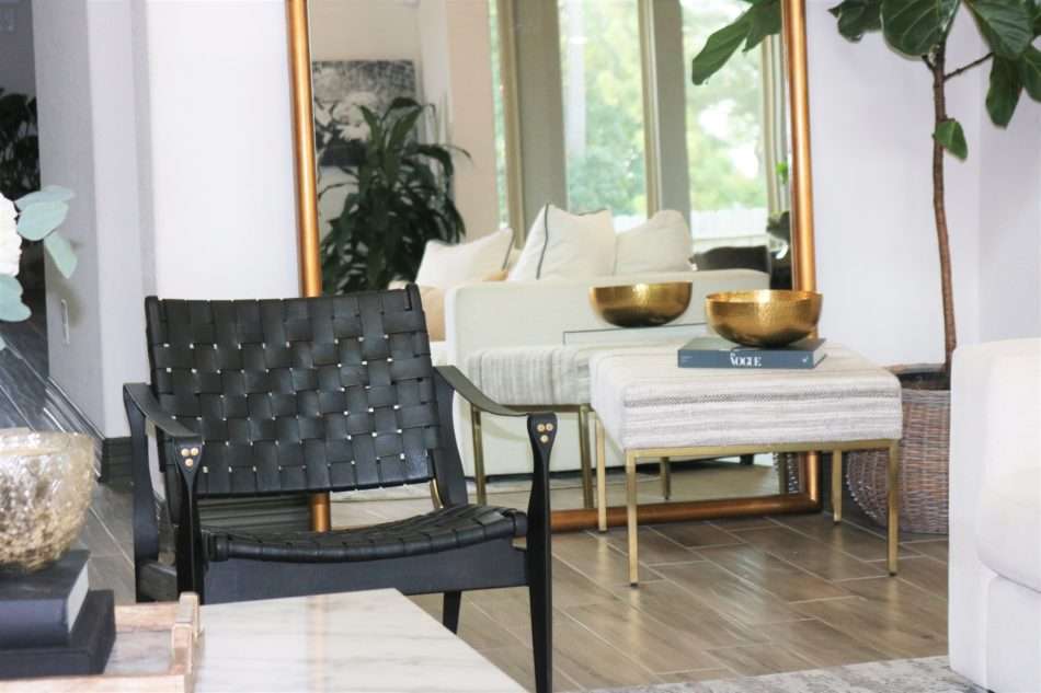 MRI, Melissa Roberts Interiors, Houston Interior Designer, Houston Interior Design, Beaumont Interior Design, Living Room Update, Living Room Reveal, Living Room Refresh, How to refresh your living room, summer living room, kitchen barstools, kitchen counter stools, kitchen pendant lights, living in your home during construction, fireplace remodel, modern fireplace, white sofa, wall mirror, gold wall mirror, chase lounge, unique chairs, living room accessories, how to style your living room, how to stage your living room, 2019 Living Rooms, minimalist design 