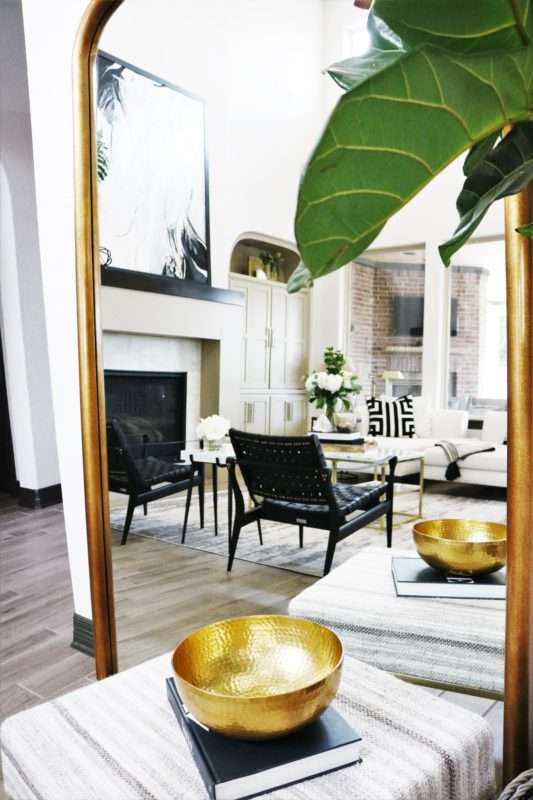 MRI, Melissa Roberts Interiors, Houston Interior Designer, Houston Interior Design, Beaumont Interior Design, Living Room Update, Living Room Reveal, Living Room Refresh, How to refresh your living room, summer living room, kitchen barstools, kitchen counter stools, kitchen pendant lights, living in your home during construction, fireplace remodel, modern fireplace, white sofa, wall mirror, gold wall mirror, chase lounge, unique chairs, living room accessories, how to style your living room, how to stage your living room, 2019 Living Rooms, minimalist design 